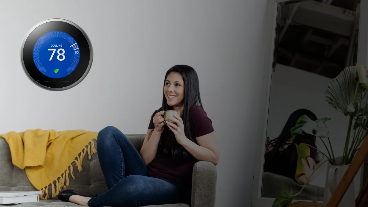 a women smiling after nest thermostat central ac repair by Little Falls HVAC