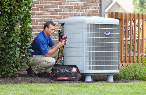 Technician doing AC repair and HVAC Tune-up at Rutherford NJ